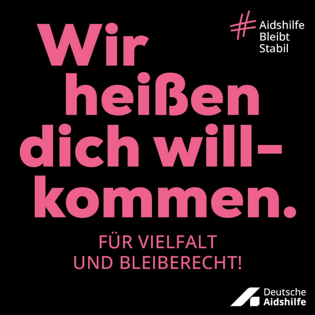 Black campaign motif with the inscription „We welcome you. For diversity and the right to stay.“