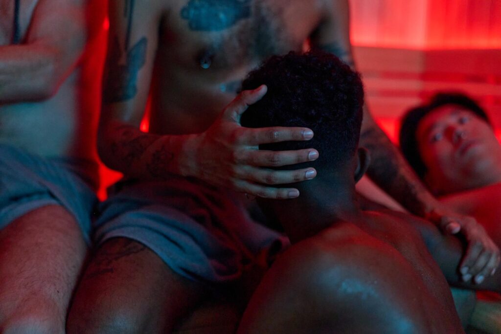 Symbolic image for porn consumption: men in an intimate sauna scene - closeness, sexuality and possible addiction in the context of gay sexuality.